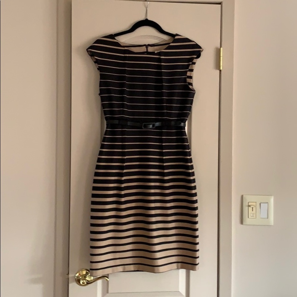 Super cute dress for any occasion. Like new.